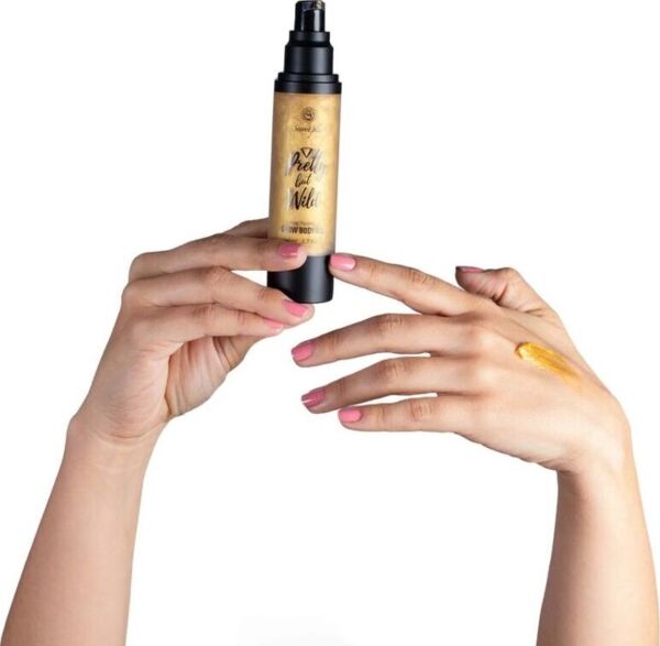 Opakowanie rozświetlającego olejku do ciała Glow Body Oil Pretty But Wild marki Secret Play